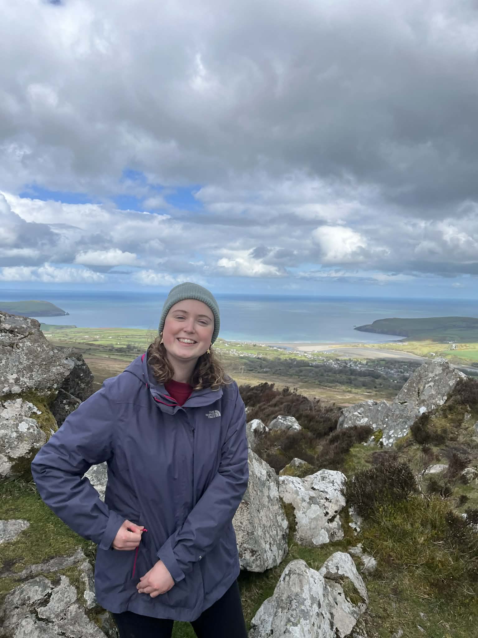 photo of Maddy on top of a hill